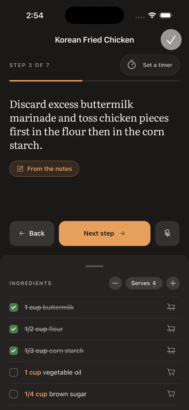 Cook mode on an iPhone, step 3 of 7 of Korean Fried Chicken: the step text large, a Next step button, and the ingredients beneath it with three already crossed off.